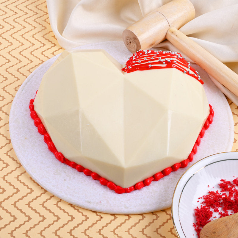 Eggless Hearty White Velvety Pinata Cake